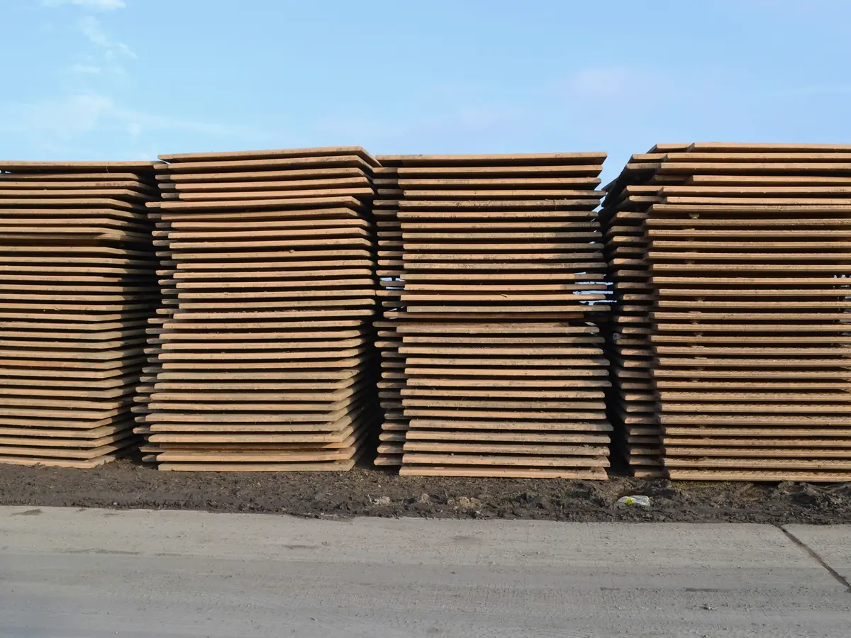 Illustrative image of stacks of hot rolled steel plate (not Jayesh Steel stock)