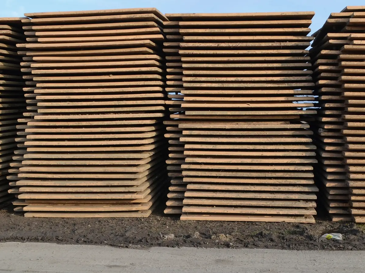 Illustrative image of the edges of stacked steel plates (not Jayesh Steel stock)