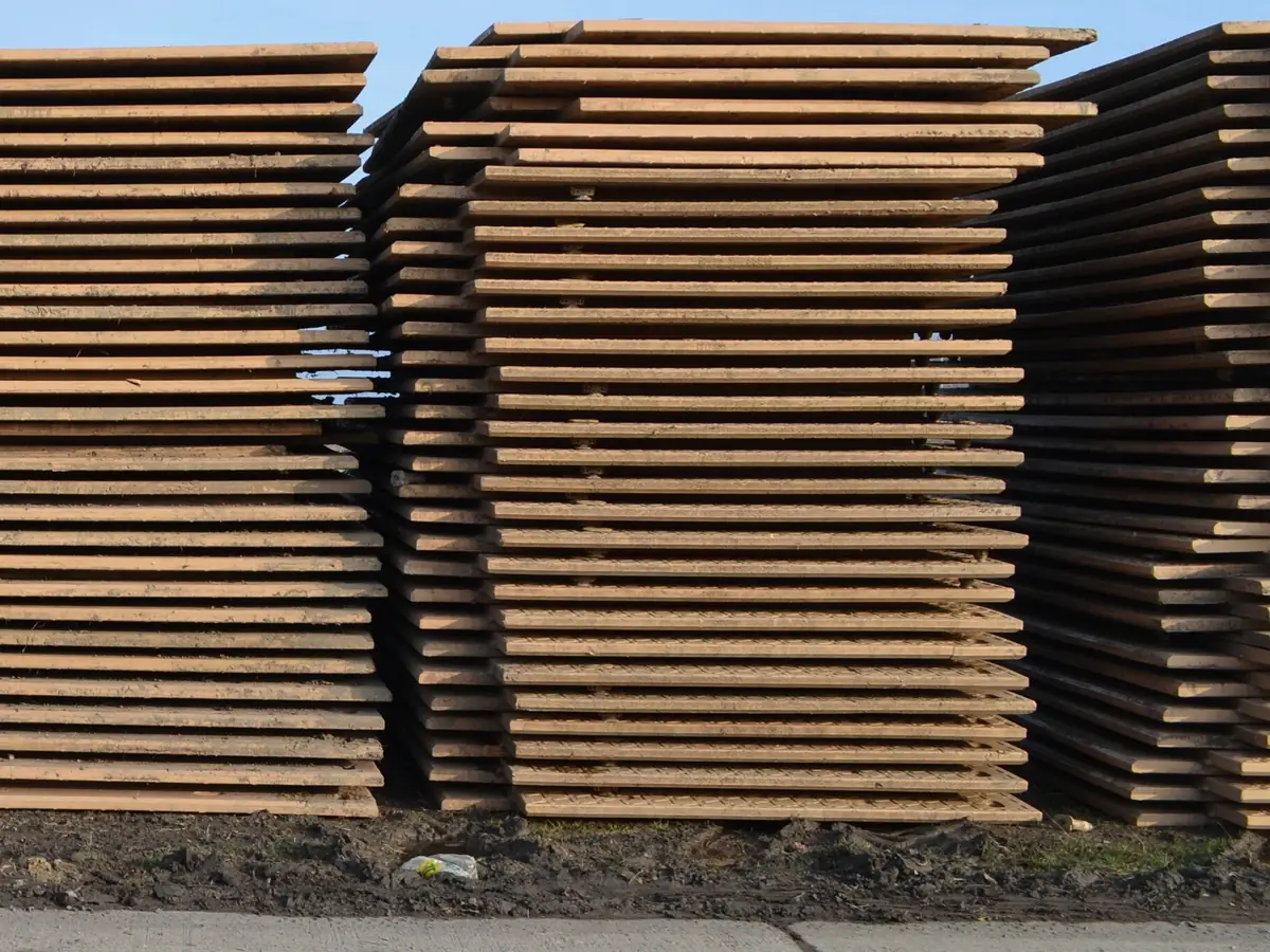 Illustrative image of stacked heavy steel plates (not Jayesh Steel stock)